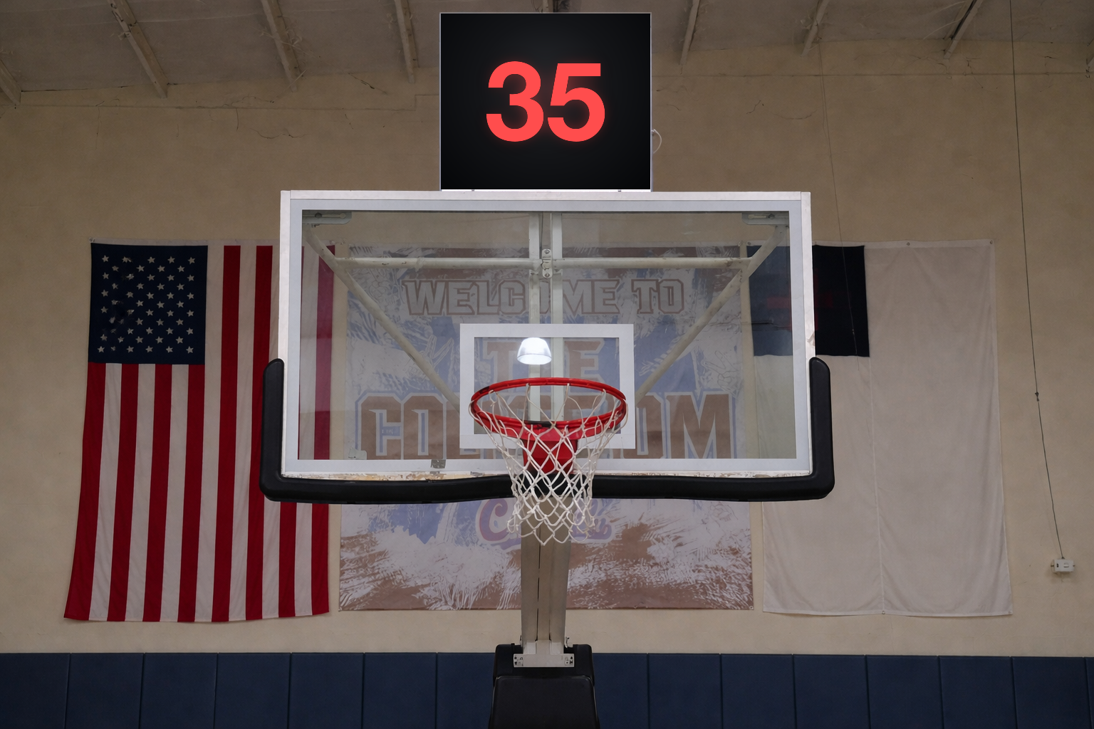 TAD365 shot clock display mounted above a basketball backboard